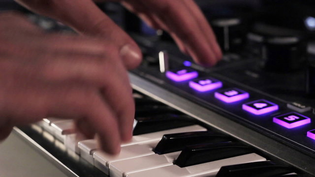 DJ using his midi controller