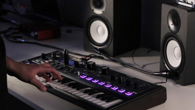 DJ using his midi controller