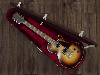 Guitar on wooden background. High resolution.