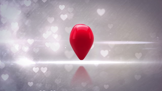 Red heart turning and exploding on glittering background