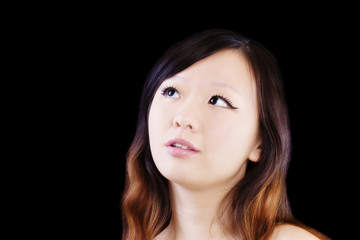 Fototapeta premium Portrait Young Attractive Chinese Woman Looking Up