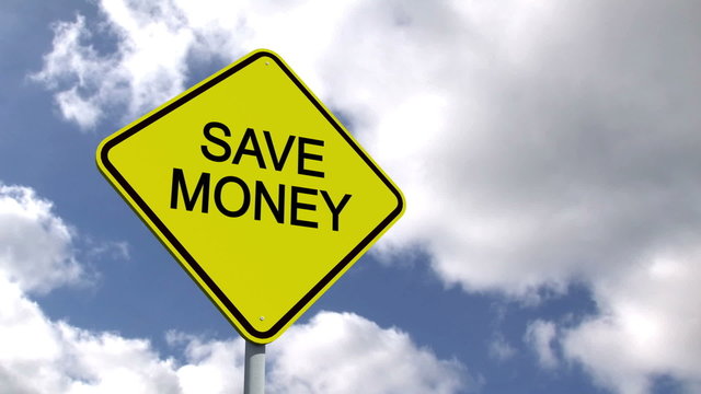 Save money sign against blue sky
