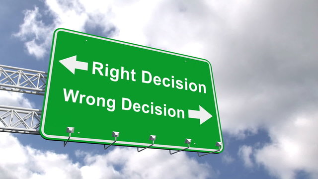 Right and wrong decision sign against blue sky