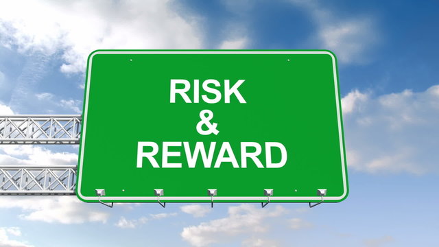 Risk and reward sign against blue sky