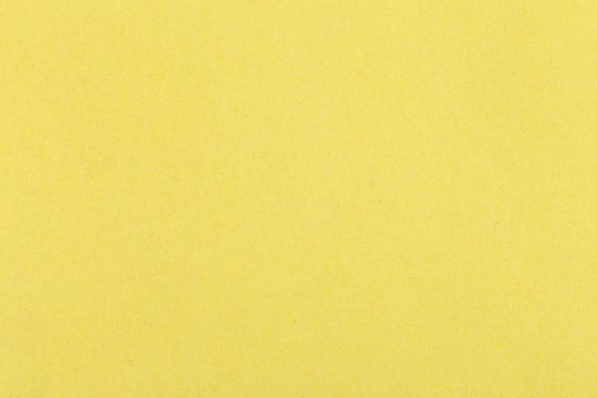 background from sheet of color yellow fiber paper