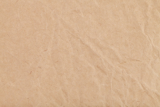 background from sheet of crumpled kraft paper