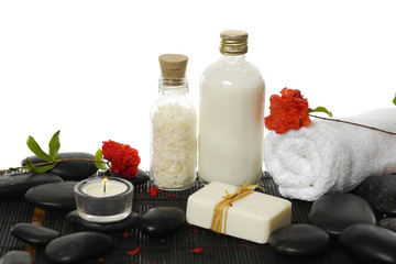 Spa setting with salt in glass ,towel , candle, soap