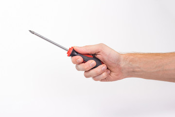 isolated male hand holding a screwdriver