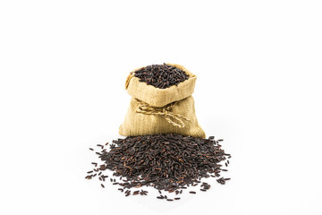 Rice berry in small burlap sack .