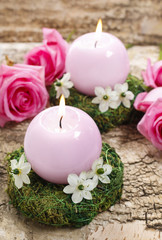 Candle holder made of moss, decorated with arabian star flowers