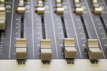 sound mixer console with highlighted button