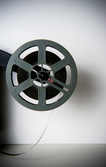 Naklejka premium Old fashioned movie reel on white background