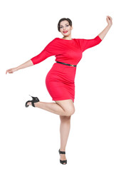 Happy beautiful plus size woman in red dress with hands up
