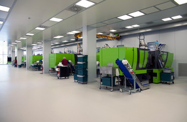 Injection molding of biomedical products in clean room
