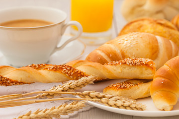 Wheat pastry with coffee and orange juice