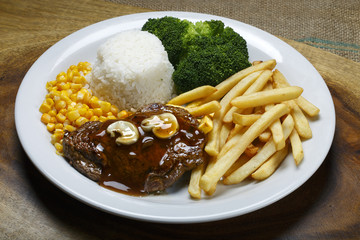 Dish with meat, potatoes and vegetables