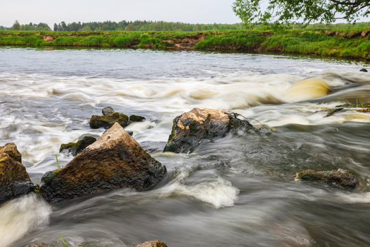 rapid flow of small river