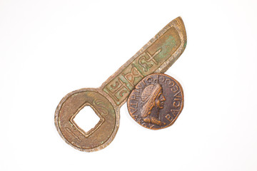 Two Antique bronze coin  on a white background