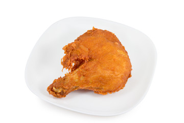 Fried chicken legs on white dish