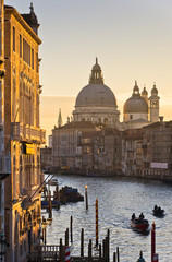 Fototapeta na wymiar Grand Canal with Santa Maria della Salute at sunrise in Venice
