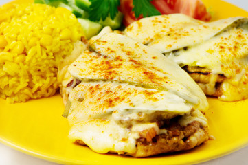 the chicken fillet baked with bacon served with rice