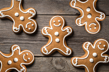 Fototapeta na wymiar Gingerbread cookies on wooden background.
