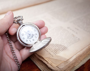 Hand with clock