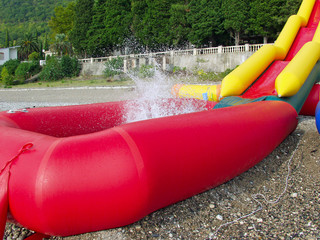 Red and yellow inflatable slides