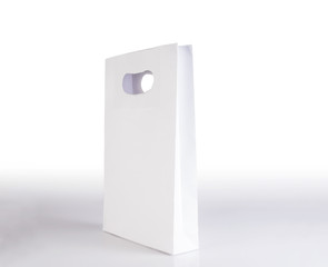 the white paper bag on white