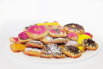 White plate with colored biscuits