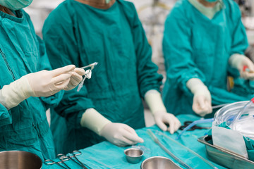 scrub nurse team prepare instruments for open heart surgery