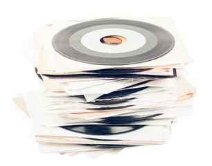 Stack of Vinyl 45 Records on White Background