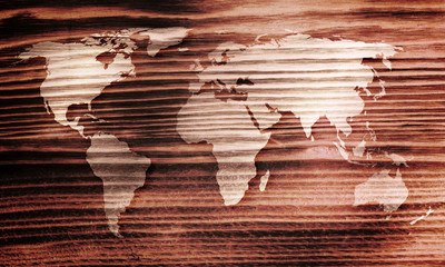 World map on wooden background