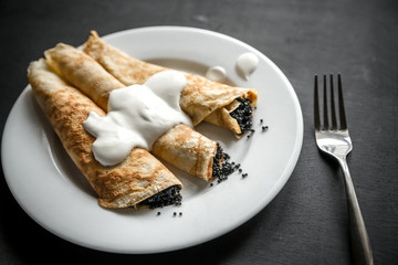 Crepes with black caviar