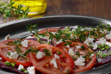 beet salad with tomatoes and feta cheese