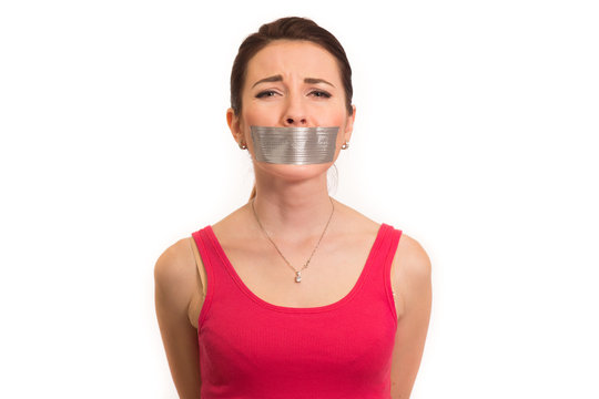 woman in red gaffer tape on mouth experiencing emotional pain