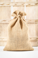 Coffee bag in front of old wooden box