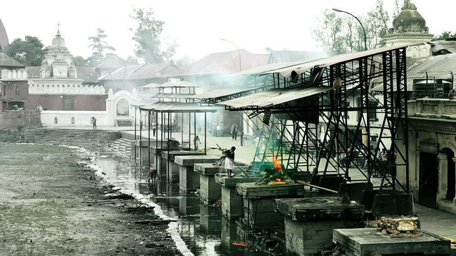 View of body cremation grounds, pashupatinath temple, kathmandu, nepal. retouched