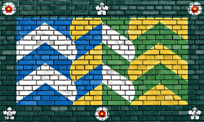 flag of Cumbria painted on brick wall