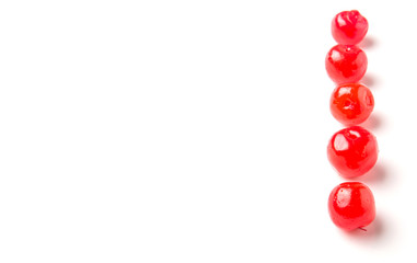Pickled cherry fruit over white background