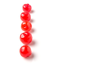 Pickled cherry fruit over white background