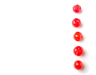 Pickled cherry fruit over white background