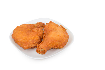 Fried chicken legs on white dish
