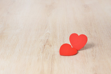 Fototapeta premium Red hearts on wooden background