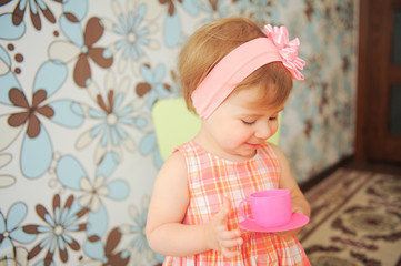 Girl with Pink Cup and Saucer