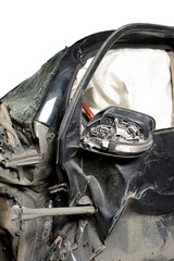 Revealed safety cushion in crumpled car in road accident
