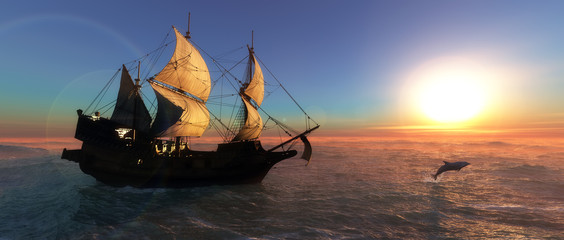 velero y puesta de sol