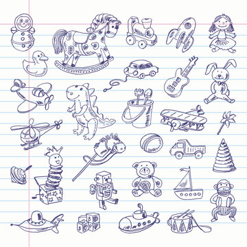 Freehand drawing retro toys items on a sheet of exercise book