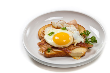 Traditional French Toasted Sandwich with fried eggs