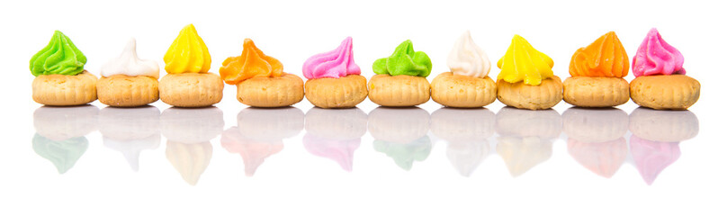 Belly button iced gem biscuits over white background